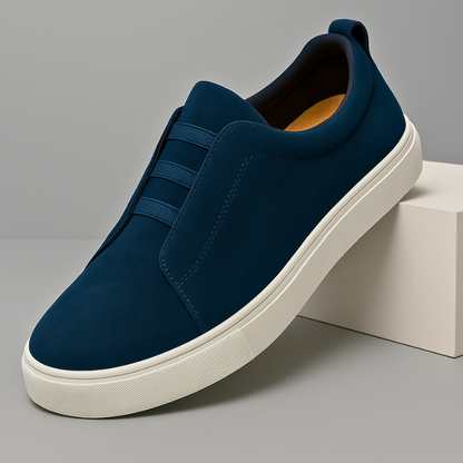 Men's sleek navy blue slip-on Chelsea sneakers, perfect for casual daily wear & stylish comfort.