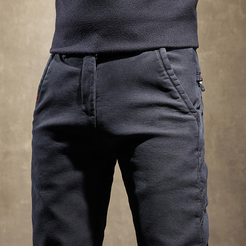 Wrinkle-resistant men's slim fit trousers, maintaining a crisp, sleek appearance with ease. Perfect dress pants.