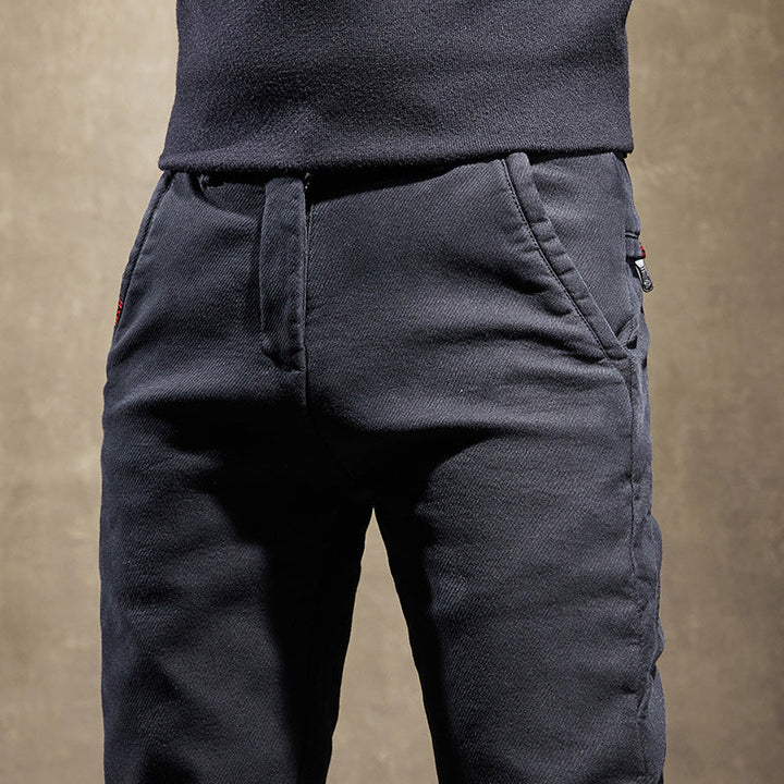 Wrinkle-resistant men's slim fit trousers, maintaining a crisp, sleek appearance with ease. Perfect dress pants.