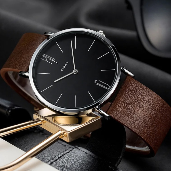Stylish men's accessory: a slim cowhide leather dress watch offering a timeless, classic appeal.