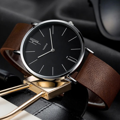 Stylish men's accessory: a slim cowhide leather dress watch offering a timeless, classic appeal.