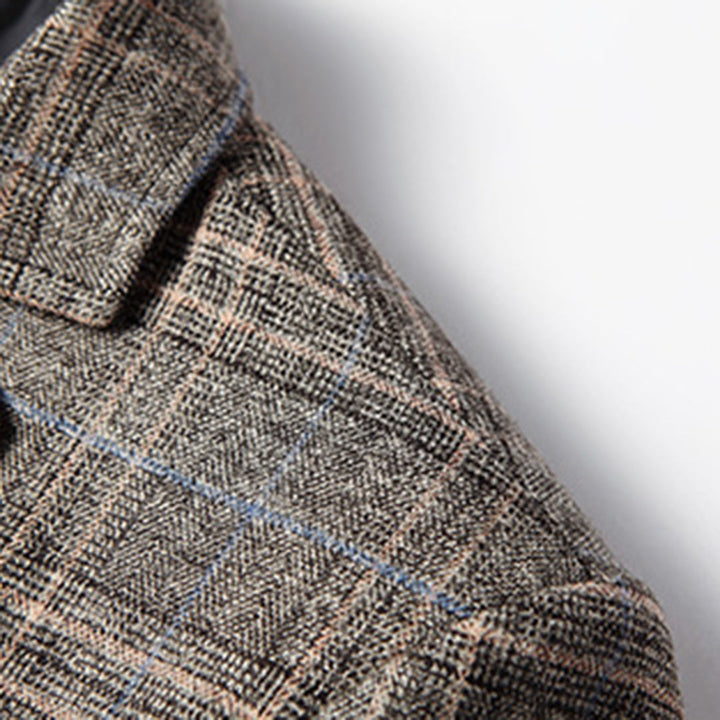 Tailored men's slim fit blazer with sophisticated embroidery, highlighting its modern cut for a sleek look.