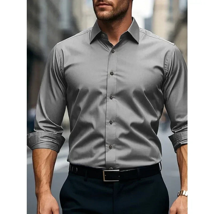 Versatile men's long sleeve button-down shirt with a tailored slim fit for any occasion.
