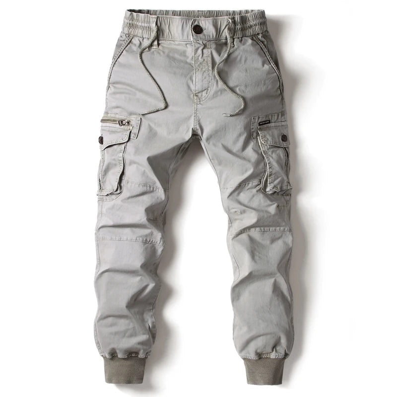 Men's slim fit cargo joggers in dark color, perfect casual pants for streetwear, activewear, and utility with ample pockets.