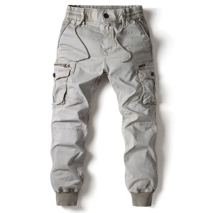 Men's slim fit cargo joggers in dark color, perfect casual pants for streetwear, activewear, and utility with ample pockets.