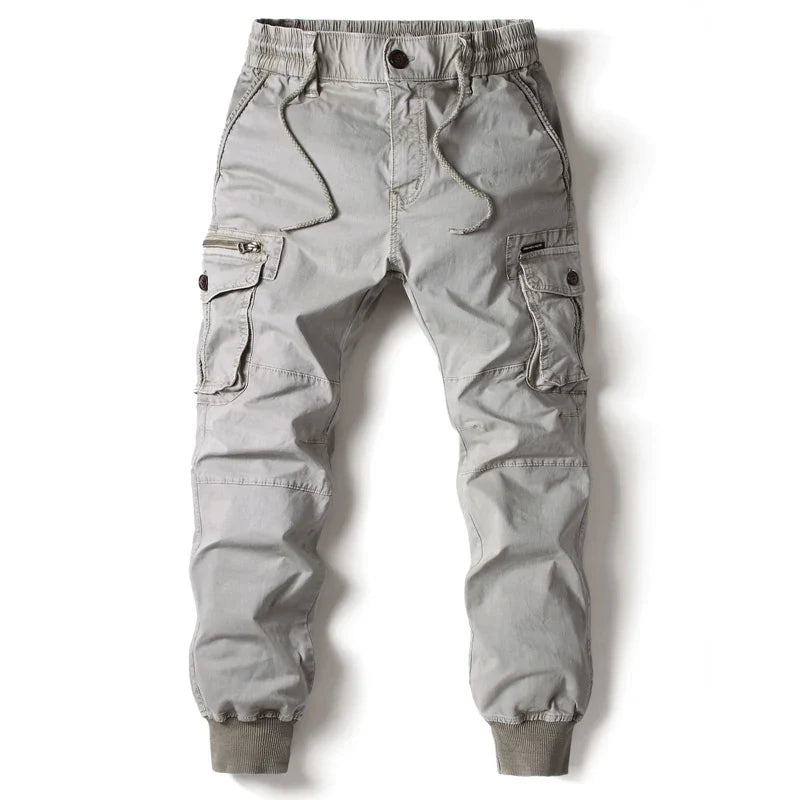 Modern men's black slim fit cargo pants. Versatile utility pants for casual wear, urban fashion, and comfortable outdoor style.