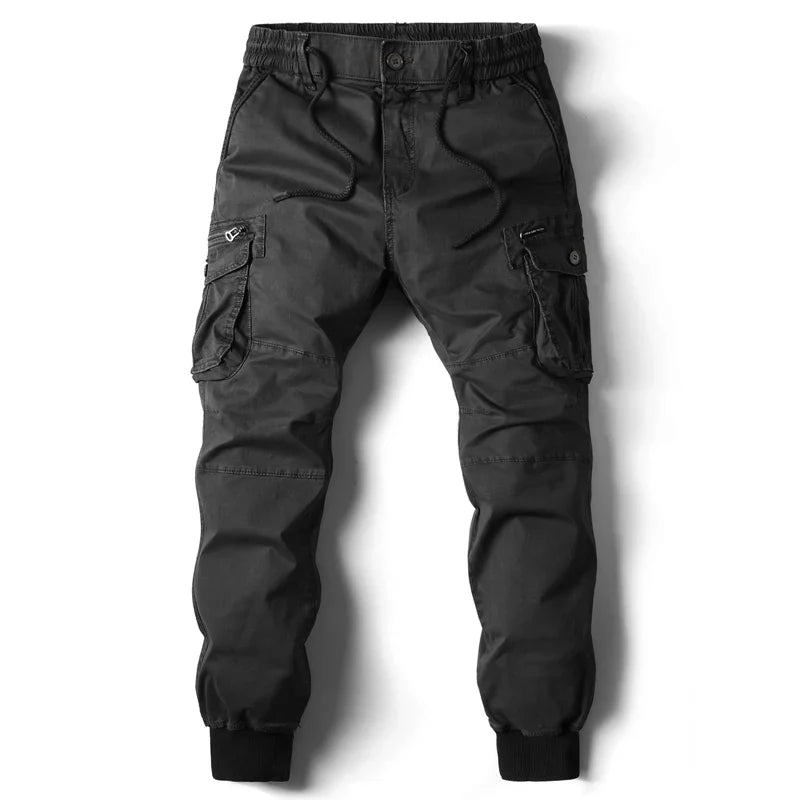 Versatile men's green slim fit cargo pants with multiple pockets. Durable utility pants for casual fashion & outdoor adventures.