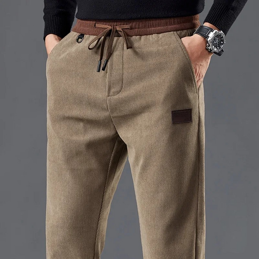 Men's slim fit casual pants with a modern style, comfortable and versatile for everyday wear.