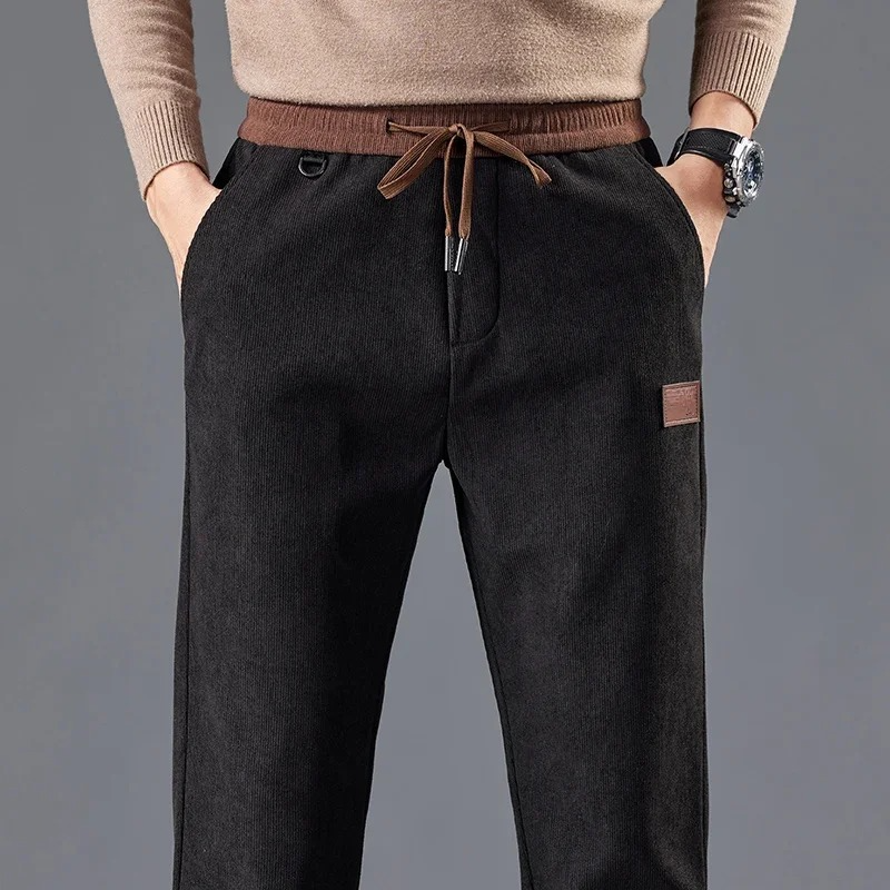 Man wearing versatile slim fit casual pants, ideal for everyday comfort and polished smart casual look.