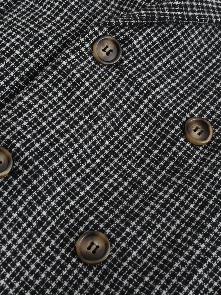 Elegant men's slim fit check blazer featuring a double-breasted front. Elevates any formal or casual ensemble.