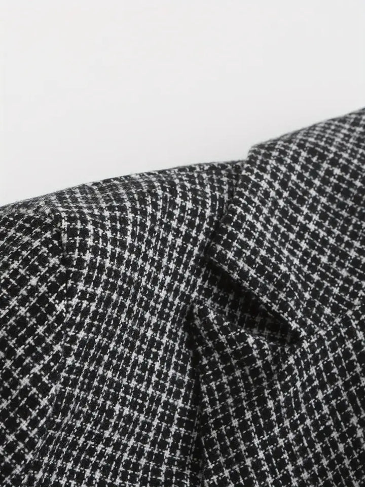 A stylish men's slim fit check double-breasted blazer, a key piece for smart casual, office, or formal outfits.