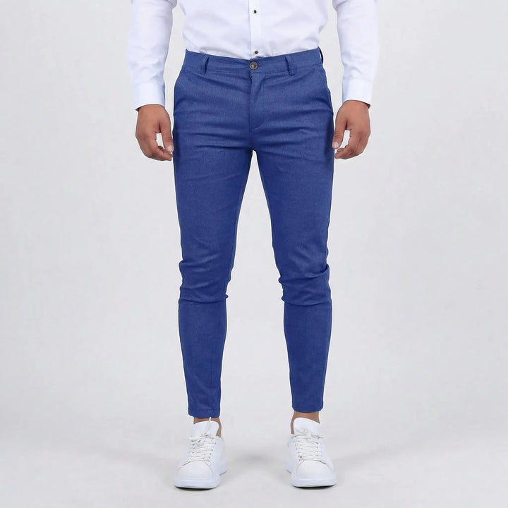 Man wearing versatile slim fit chino pants, perfect for everyday workwear & casual style.