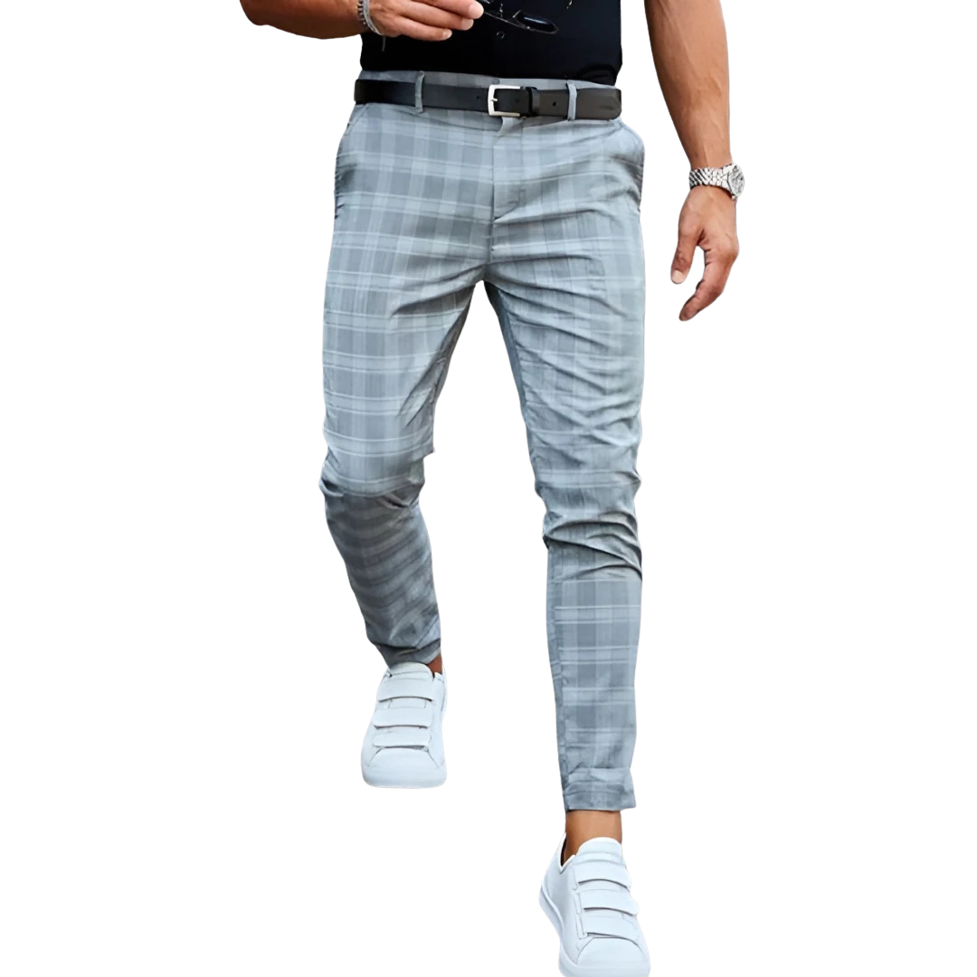 Stylish men's slim fit checked trousers, cropped for a modern aesthetic, ideal for tailored fashion.