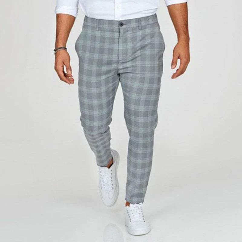 Versatile men's cropped checked pants, slim fit design for both office wear and smart casual occasions.
