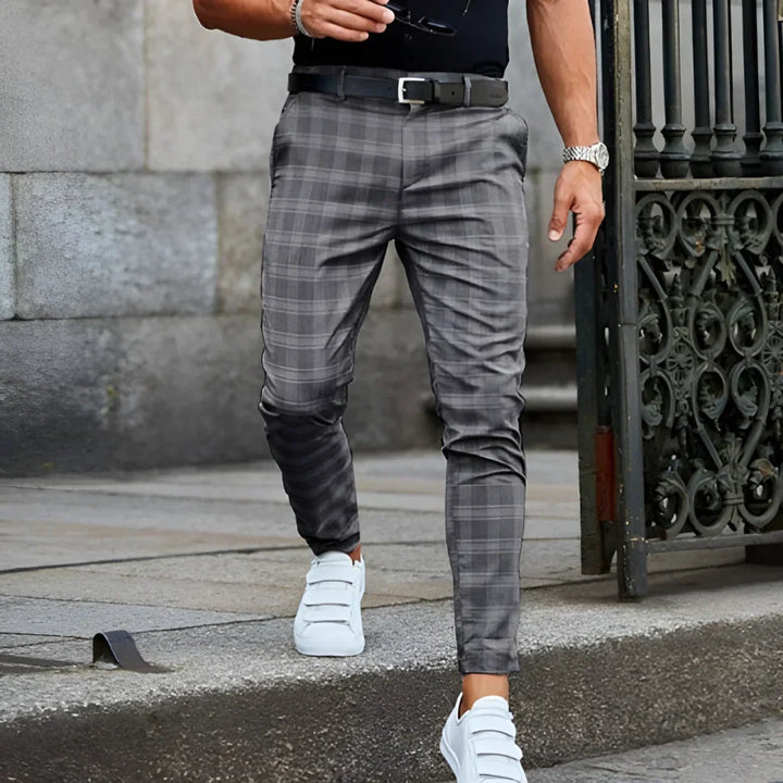 Men's fashion: slim fit cropped checked pants styled for a modern, effortlessly chic look.