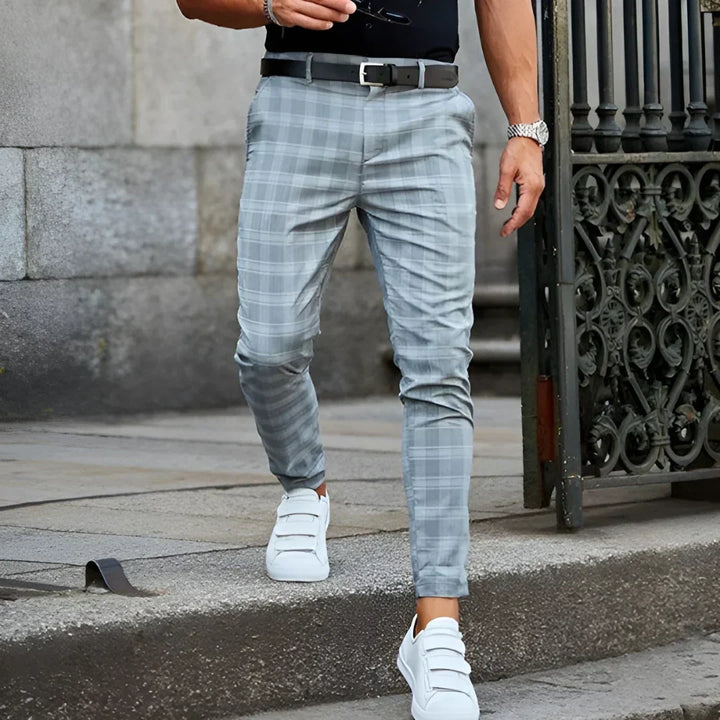 Trendy men's slim fit cropped checked pants, a key piece for modern fashion and versatile daily wear.