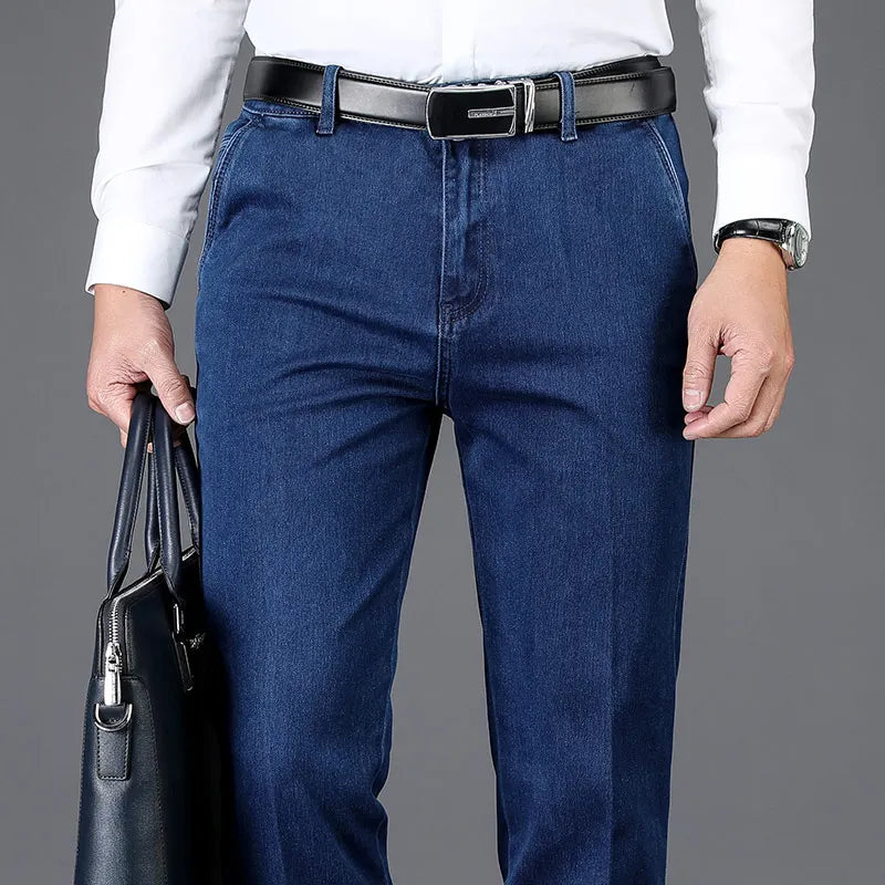 Back view of men's slim fit denim trousers, showcasing fit, pocket design, and comfortable stretch fabric.
