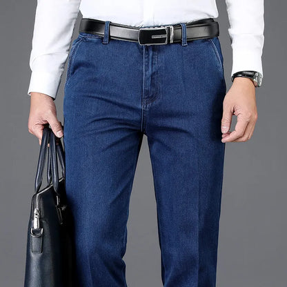 Back view of men's slim fit denim trousers, showcasing fit, pocket design, and comfortable stretch fabric.