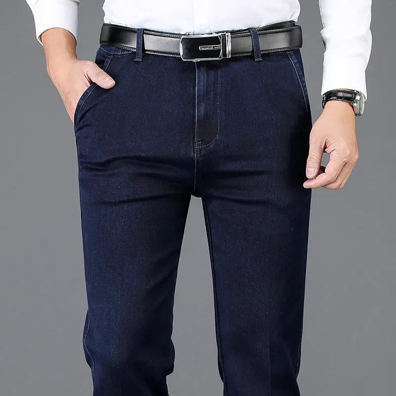 Full-length shot of versatile men's slim fit denim trousers with stretch, ideal for modern casual fashion.