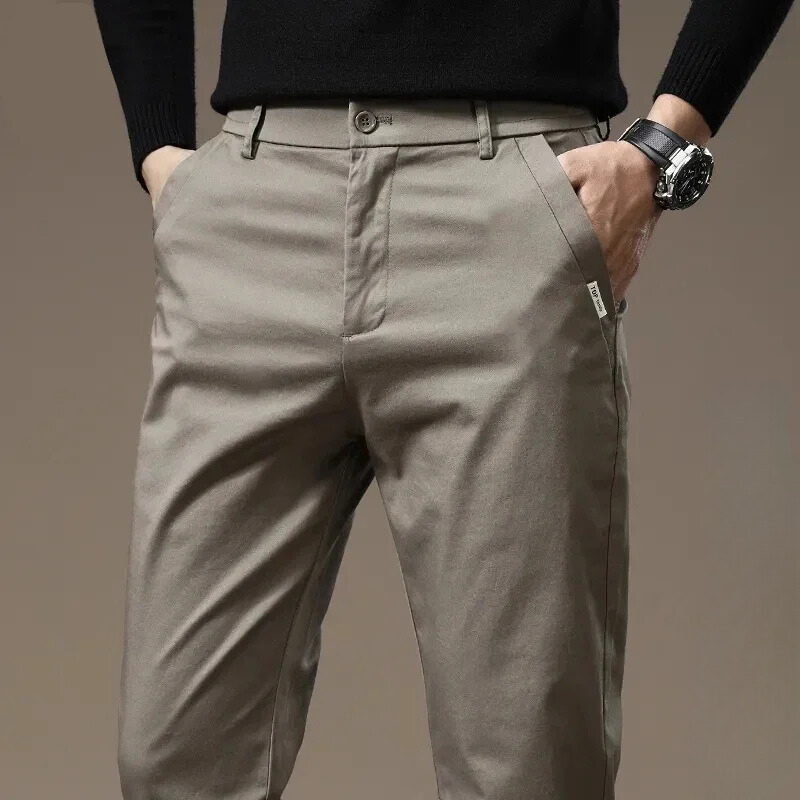 Men's slim fit dress pants, wrinkle-free comfort, modern versatile style for casual or formal wear.