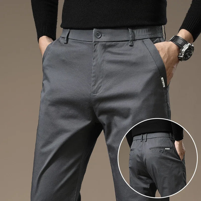 Comfortable men's wrinkle-free dress pants, slim fit design for versatile everyday casual fashion.