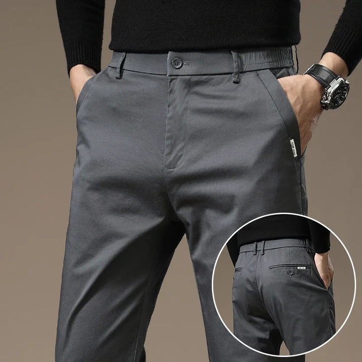 Comfortable men's wrinkle-free dress pants, slim fit design for versatile everyday casual fashion.