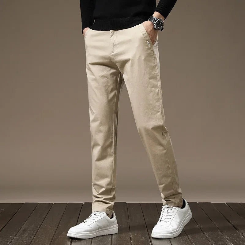 Versatile men's slim fit trousers, perfect as casual or dress pants, featuring wrinkle-free comfort.
