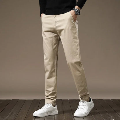 Versatile men's slim fit trousers, perfect as casual or dress pants, featuring wrinkle-free comfort.
