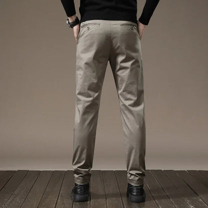 Smart men's wrinkle-free slim fit pants, comfortable and stylish for work, casual outings, or travel.