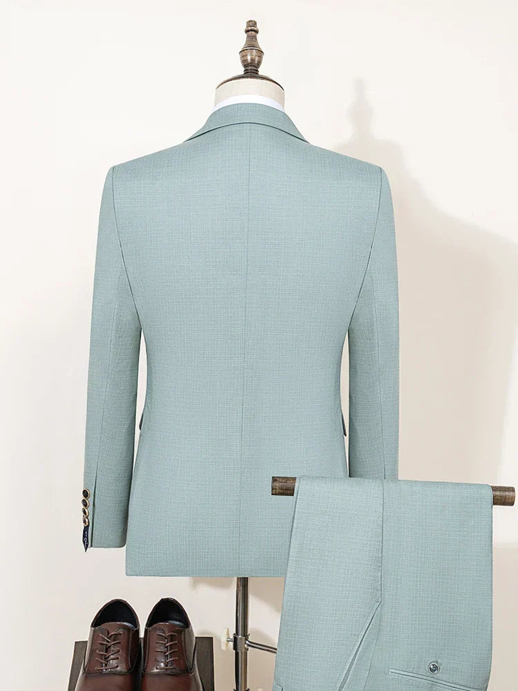 Lightweight men's slim fit green suit. Ideal three-piece formal wear for summer weddings & outdoor events.