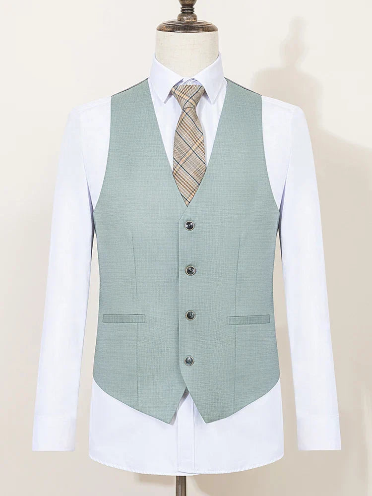 Stylish men's slim fit green three-piece suit. Modern design for summer business, weddings & elegant events.
