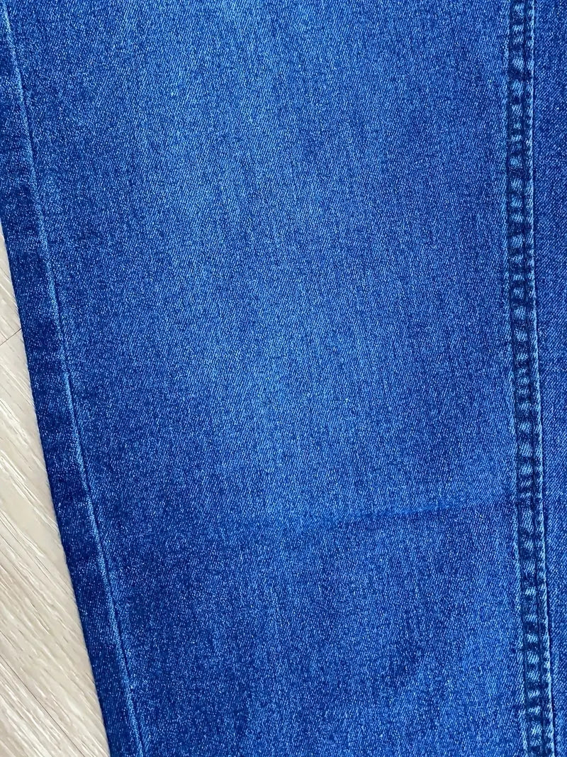 Modern men's tapered fit slim jeans, offering ultimate comfort & style for a contemporary casual look.