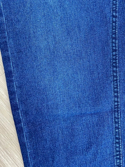 Modern men's tapered fit slim jeans, offering ultimate comfort & style for a contemporary casual look.