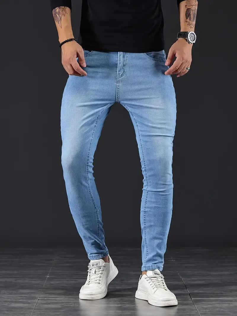 Light blue men's slim fit jeans, stylish & comfortable, perfect for casual everyday wear. Modern appeal.