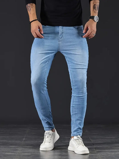 Light blue men's slim fit jeans, stylish & comfortable, perfect for casual everyday wear. Modern appeal.