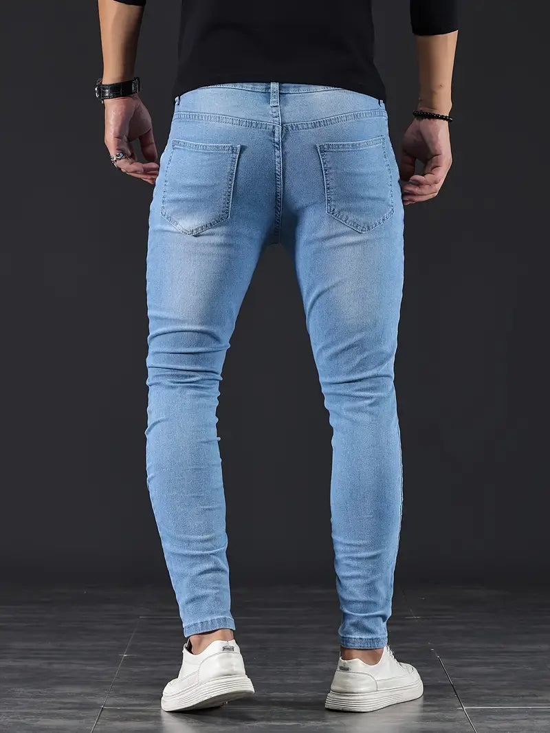 Black men's slim fit jeans, sleek & modern, offering ultimate comfort & a tapered fit for any occasion.