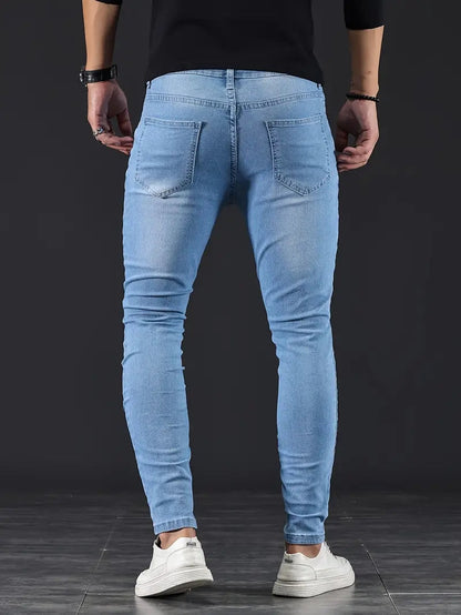 Black men's slim fit jeans, sleek & modern, offering ultimate comfort & a tapered fit for any occasion.