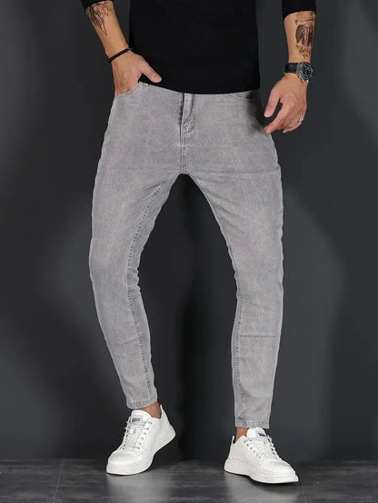 Gray men's slim fit jeans, versatile comfort jeans for everyday wear, modern and flexible casual pants.