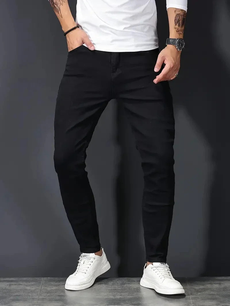 Comfortable & flexible men's slim fit jeans, modern design perfect for active everyday wear. Casual pants.