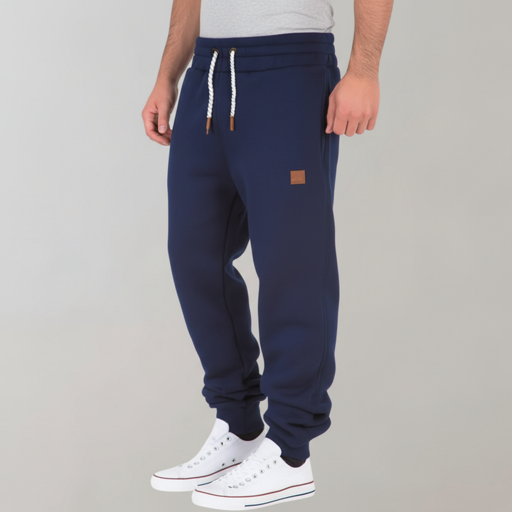 Athletic men's slim-fit joggers, ideal for workout wear & providing ultimate comfort during exercise.