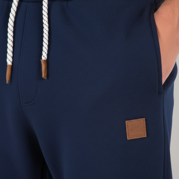 Stylish men's slim-fit joggers, versatile for sportswear, leisure wear, or modern casual trousers.