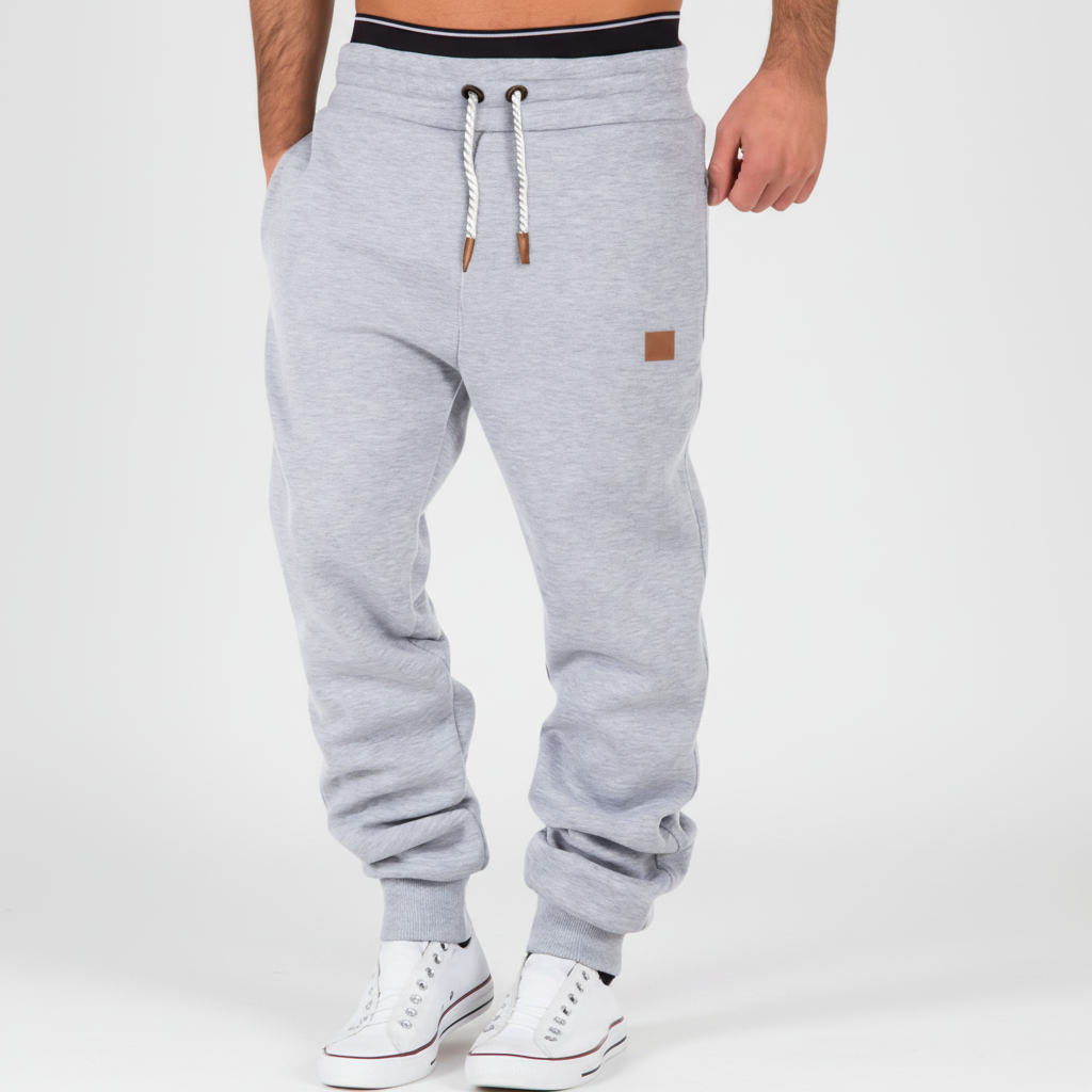 Multi-color options of men's slim-fit joggers, offering comfort & style for activewear or casual outfits.