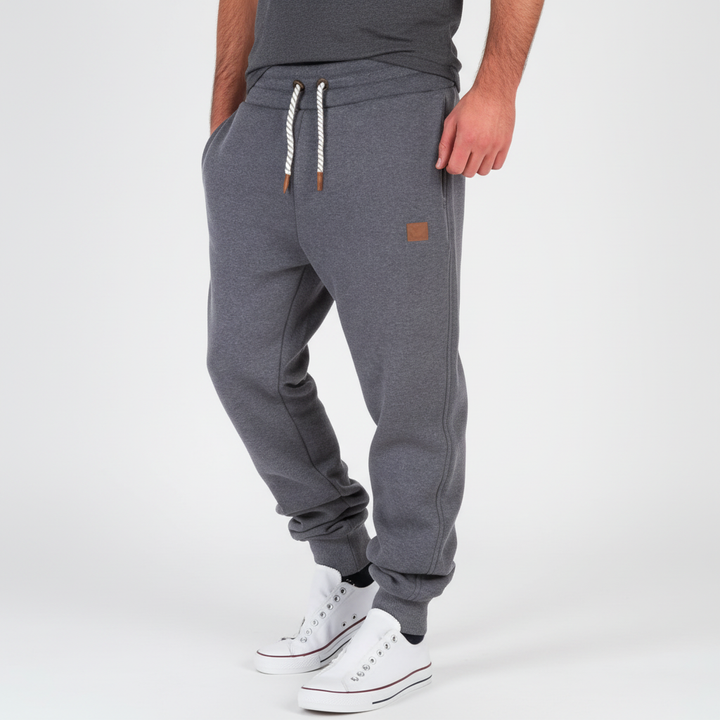Men's Lance slim-fit joggers with elastic waist, offering comfort & flexibility for workouts or leisure.