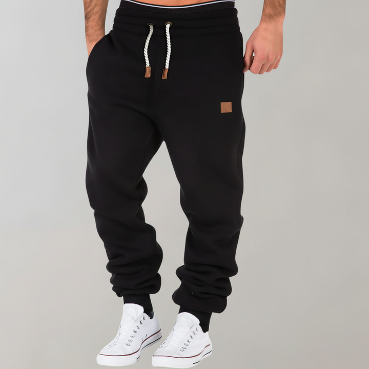 Premium men's slim-fit joggers, combining men's fashion with athletic function for versatile wear.