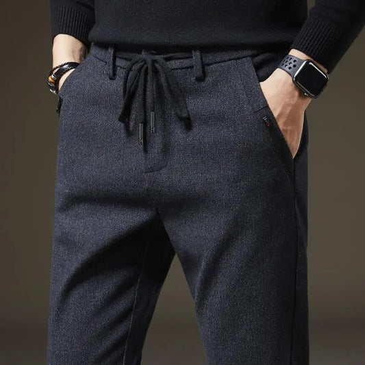 Men's slim fit pants, comfortable & stylish for everyday wear. Wrinkle-resistant drawstring casual pants.