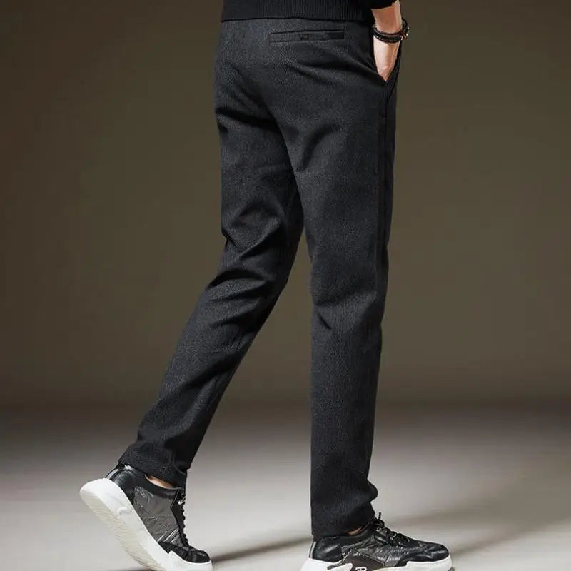 Man wearing stylish slim fit casual pants, comfortable for everyday wear. Perfect for men's fashion.