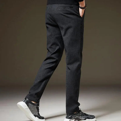 Man wearing stylish slim fit casual pants, comfortable for everyday wear. Perfect for men's fashion.