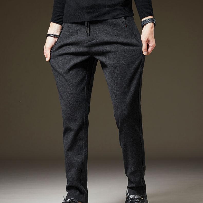 Soft & comfortable men's slim fit pants, versatile for all-day comfort. Wrinkle-resistant for travel.