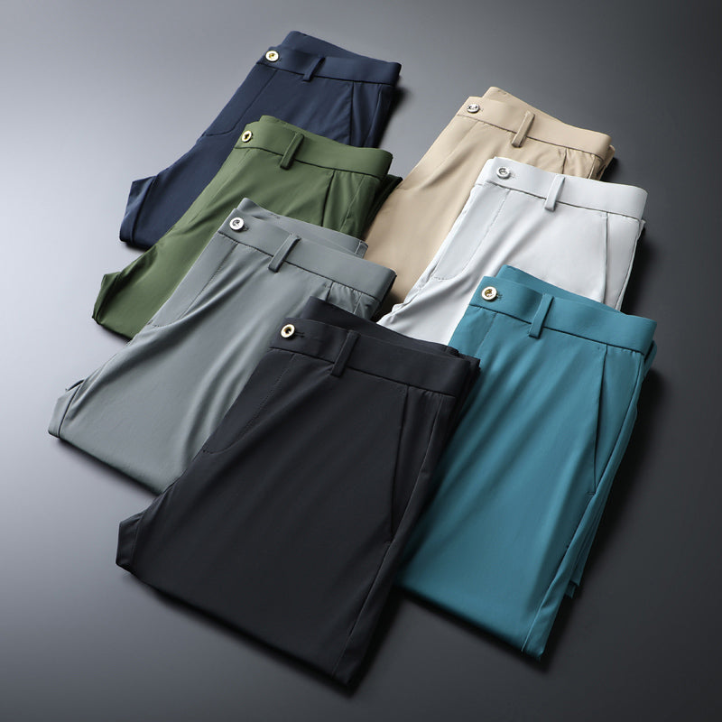 Front view of men's khaki slim fit performance dress trousers, showcasing sleek, modern design.