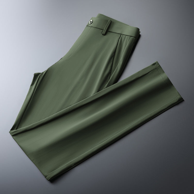 Back view of men's navy slim fit performance trousers, highlighting pocket details and stretch fit.